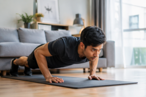 man doing push up at home