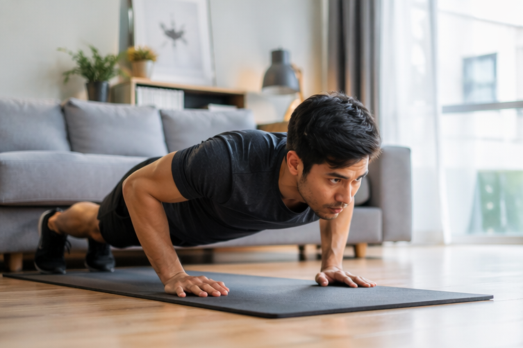 man doing push up at home